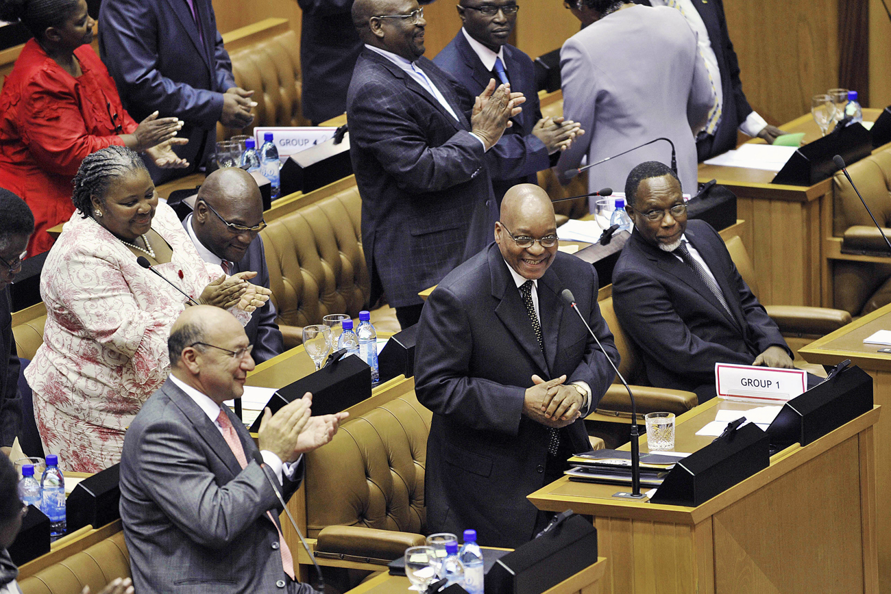 South African ruling party ANC members applaude their president Jacob Zuma during special session to formally elect the country's president in Parliament in Cape Town