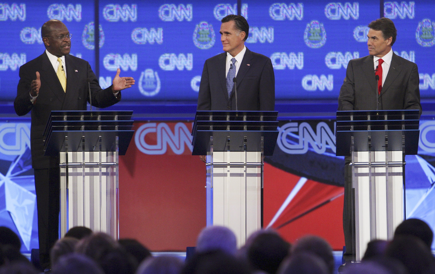 US 2012: Raising Cain, Perry plummets, Romney's mitts off