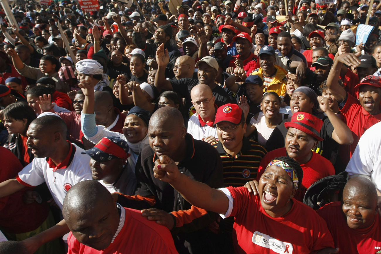 Members of COSATU march through the streets of Cape Town