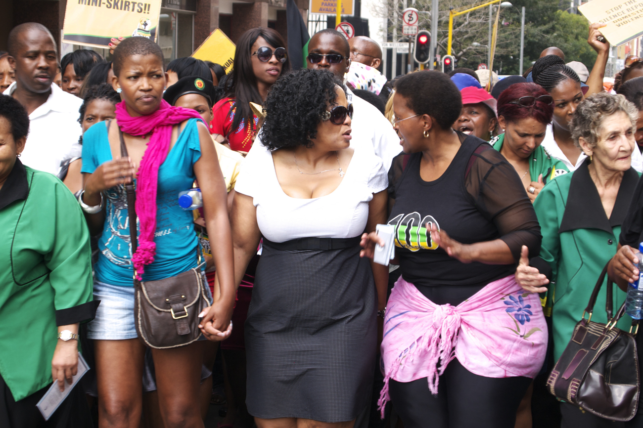 A man at a miniskirt march