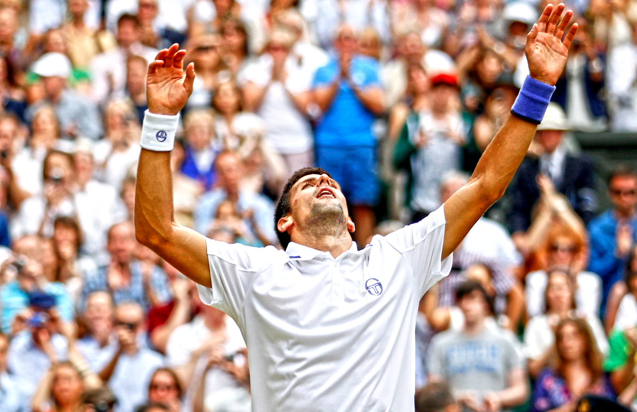 Novak Djokovic of Serbia reacts after defeating Rafael Nadal of Spain in the men's singles final at the Wimbledon tennis championships in London