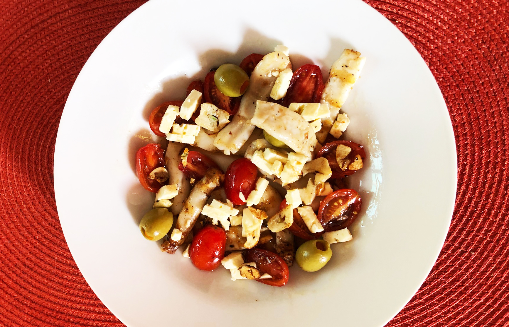 Warm Calamari Salad with Green Olives, Macerated Tomatoes, Garlic and Feta