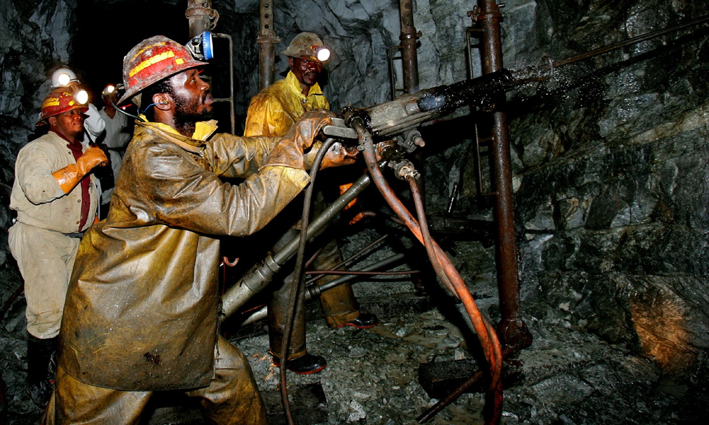 Mineworkers work deep underground at Harmony Gold Mine's Cooke shaft near Johannesburg, September 22..