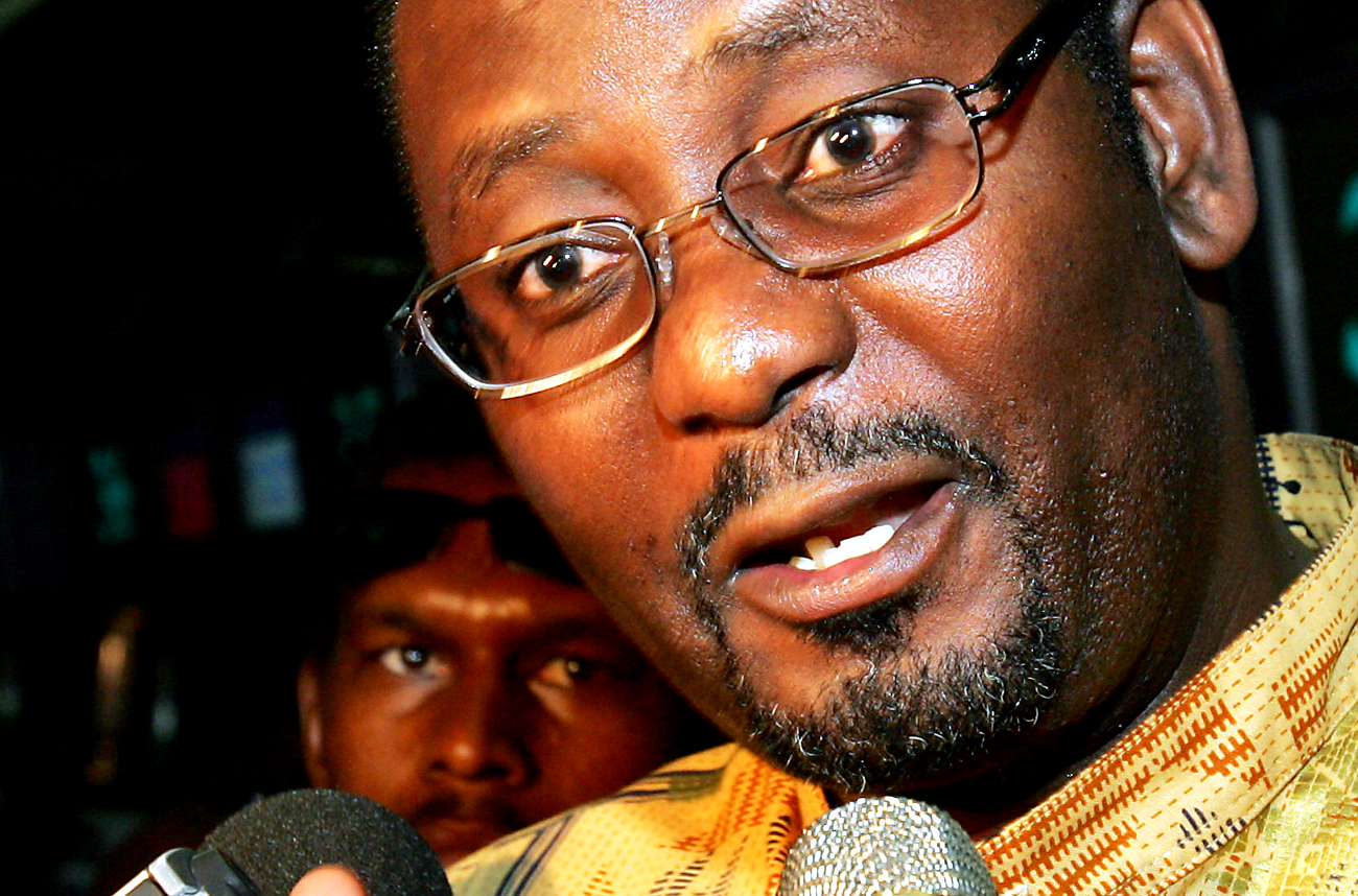Secretary General of COSATU Zwelinzima Vavi talks with media at Johannesburg airport