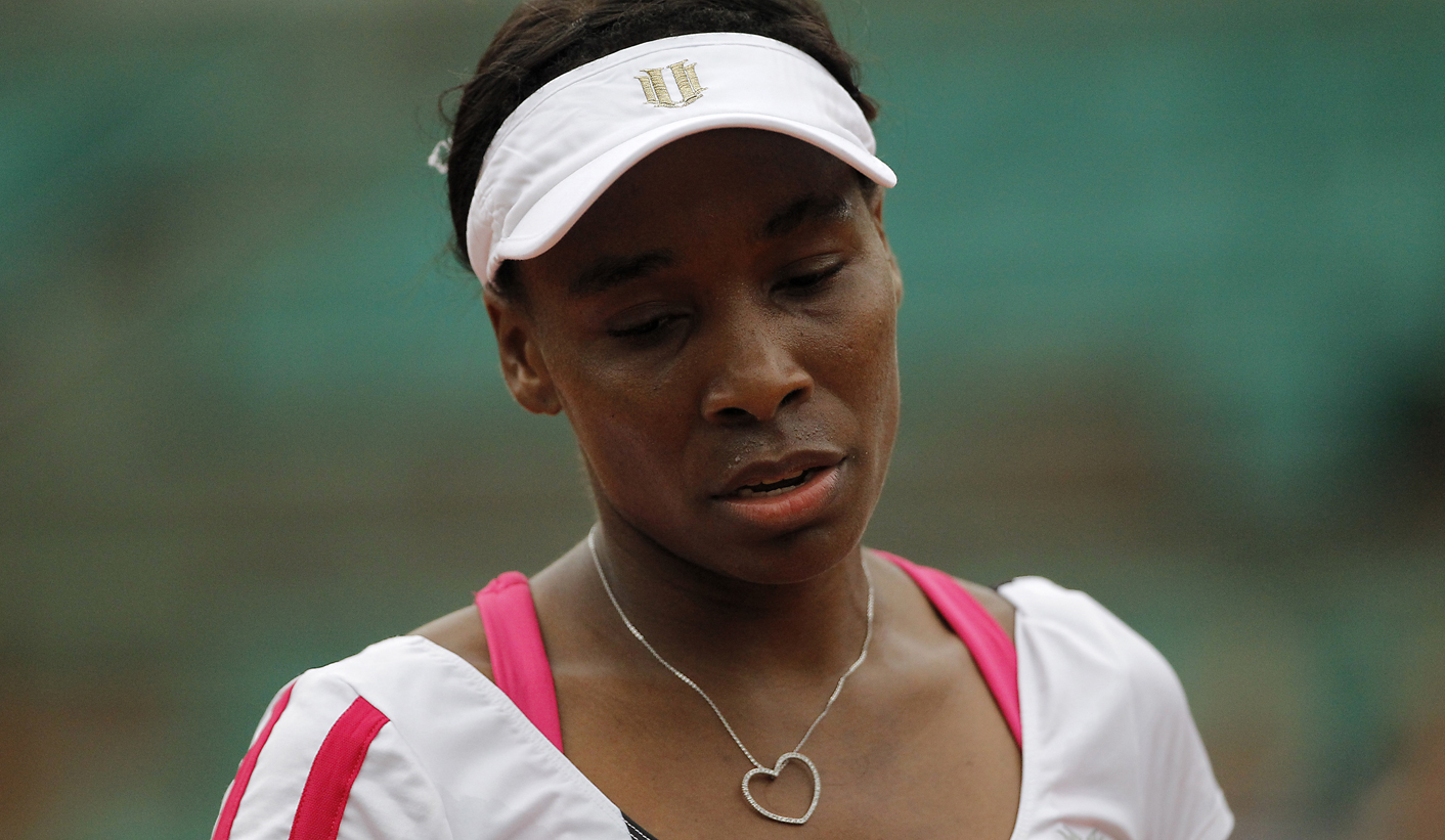 Venus joins Serena in early French Open exit