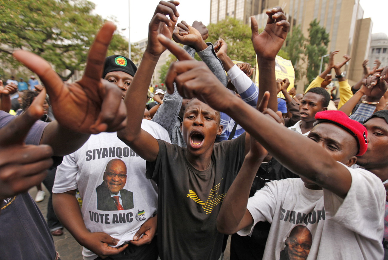 Supporters of the ANC Youth League chant slogans as they take part in a march in central Johannesburg