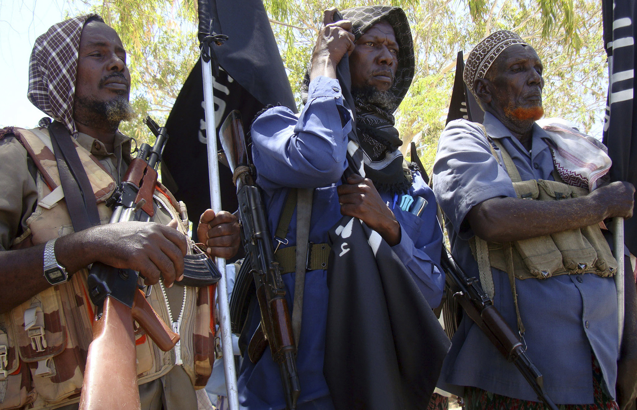 Elderly Somali men parade as members of al Shabaab in the capital Mogadishu