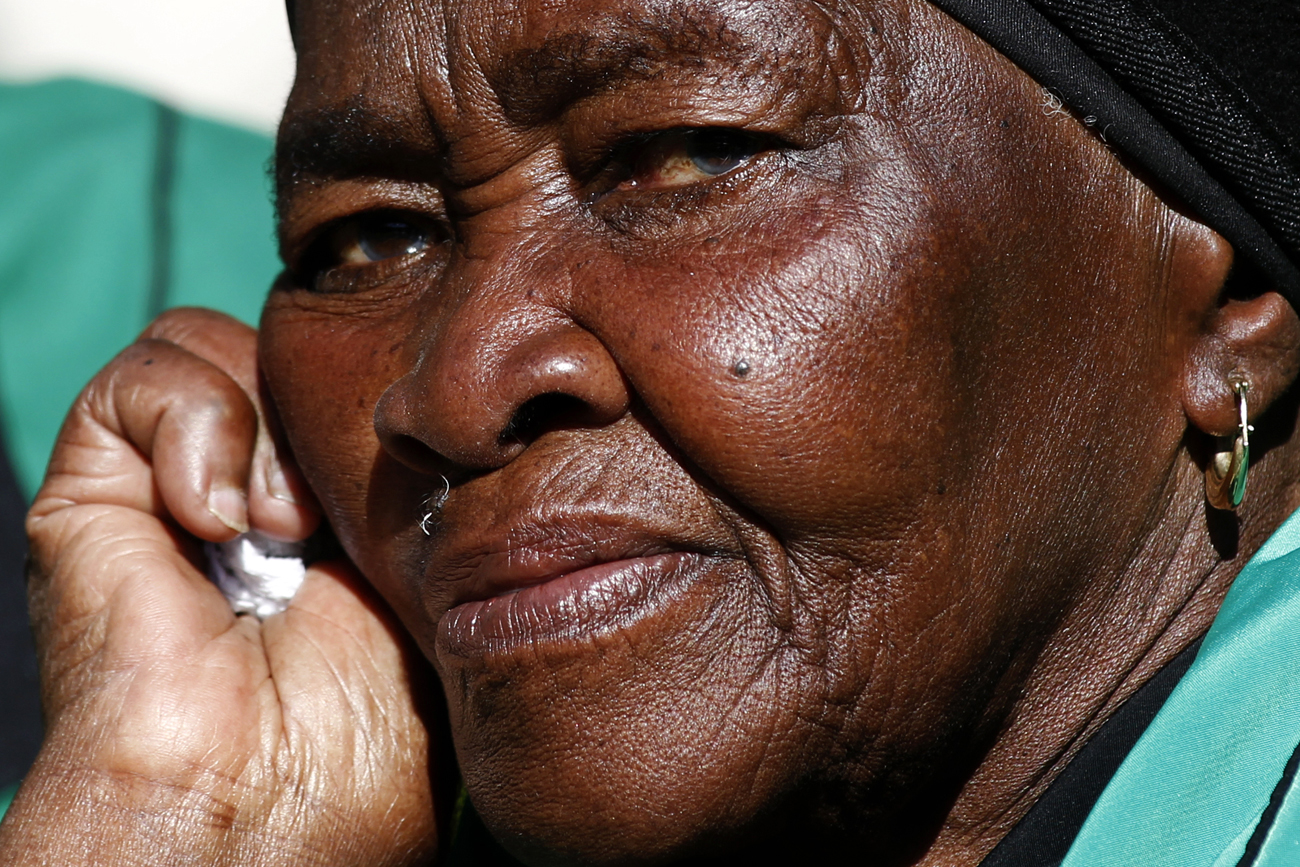 A member of the African National Congress Women's League attends the funeral of Albertina Sisulu in Soweto