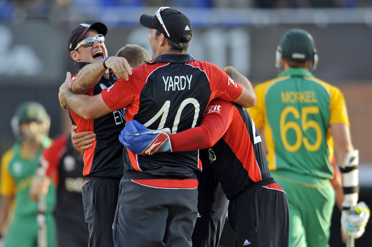 England's players celebrate after they defeated South Africa in their ICC Cricket World Cup group B match in Chennai