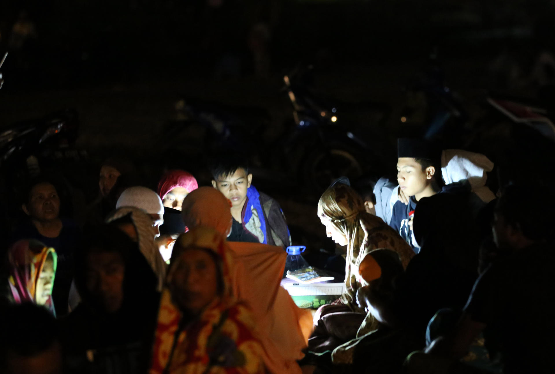Rescuers search for survivors after Indonesia quake kills 82
