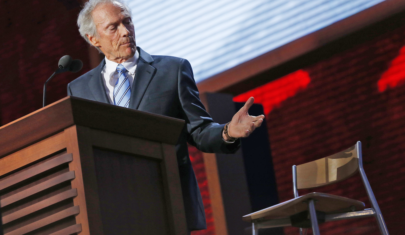 Actor Clint Eastwood addresses an empty chair during the final session of the Republican National Convention in Tampa