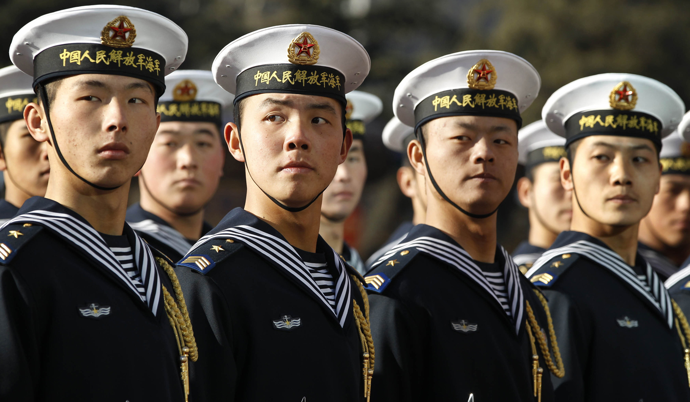 Members of the Chinese Navy's honor guard wait for U.S. Secretary of Defense Gates to review troops in Beijing