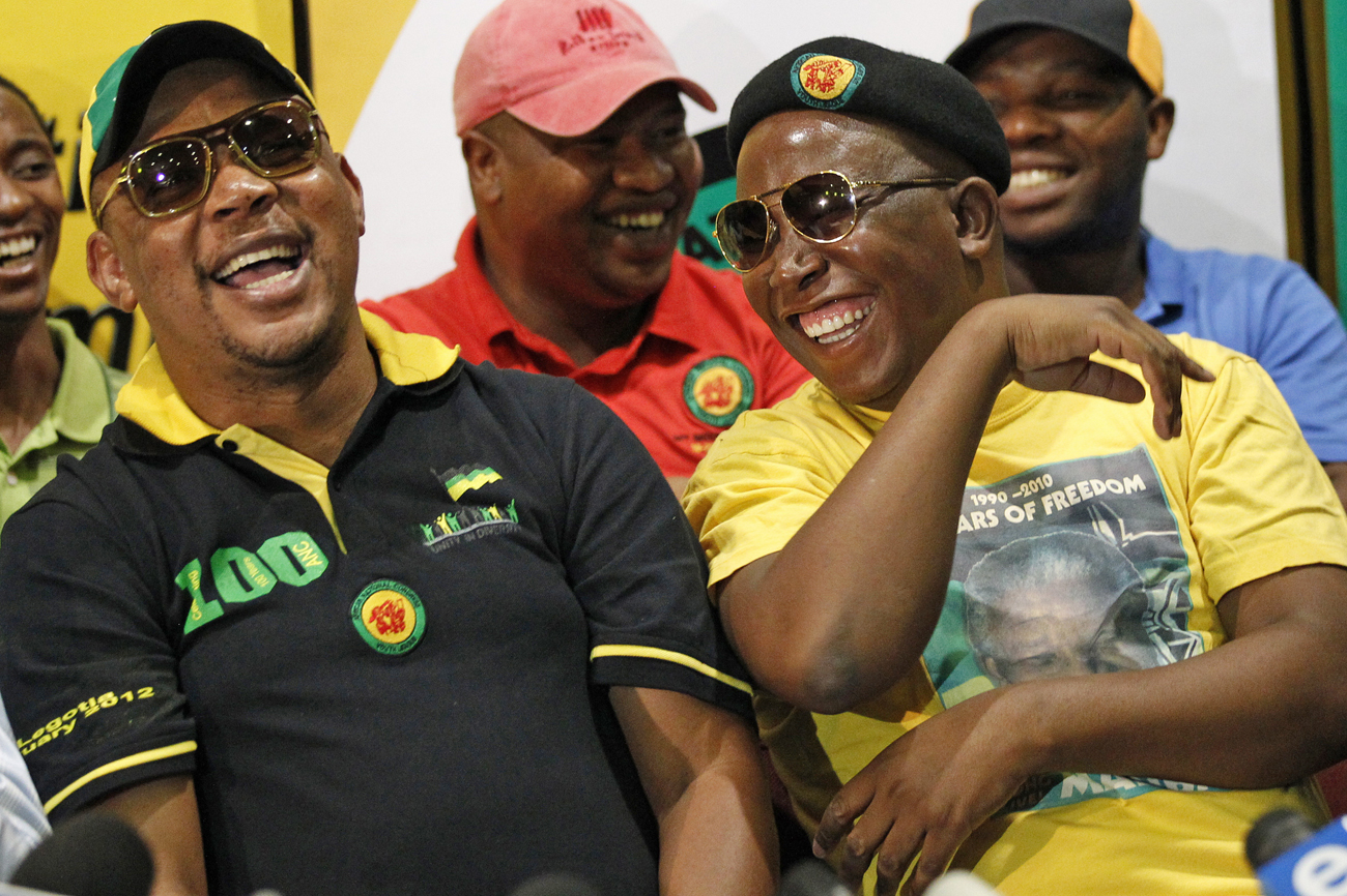 Expelled ANC Youth League President Malema gestures with suspended Treasurer-General Mabe in Johannesburg