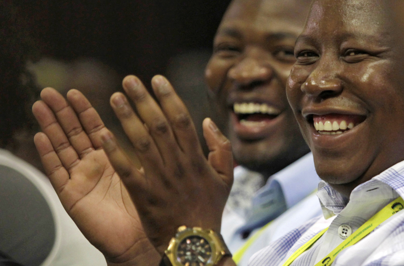 African National Congress Youth League leader Julius Malema listens as President Jacob Zuma delivers the closing address at the National General Council of his ruling African National Congress