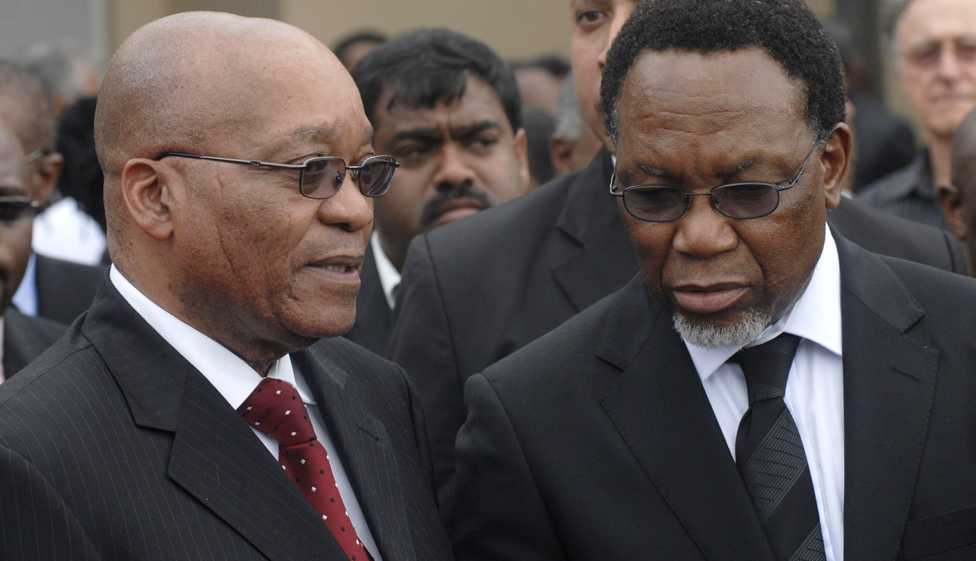 South African President Motlanthe and ANC President Zuma speak after funeral of anti-apartheid activist Nair in Durban