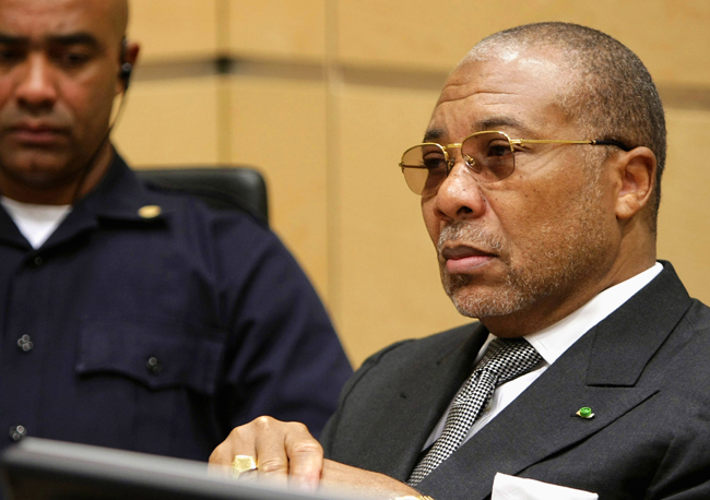 Former Liberian President Taylor sits in the courtroom of the International Criminal Court in The Hague