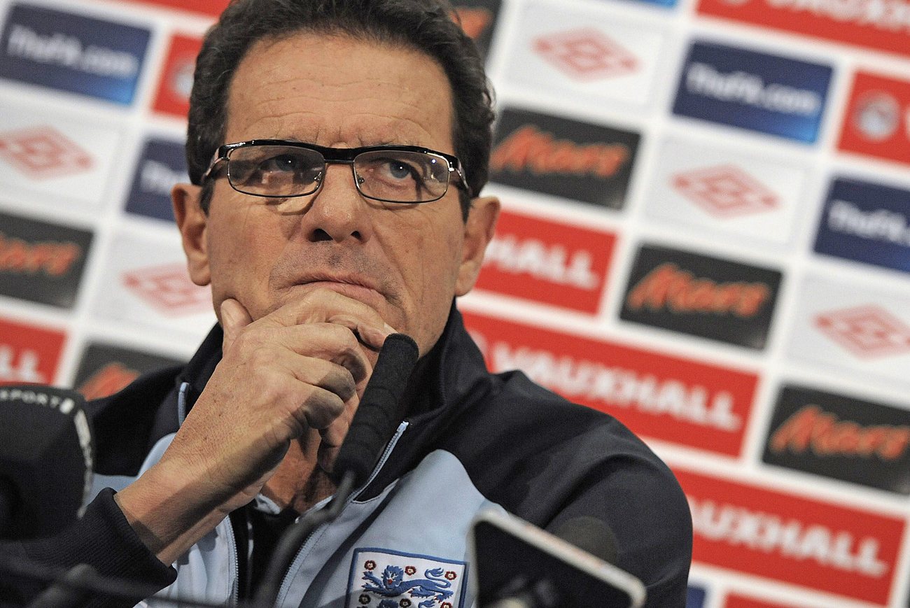 File photograph shows England's manager Fabio Capello listening during a news conference at Wembley stadium in London