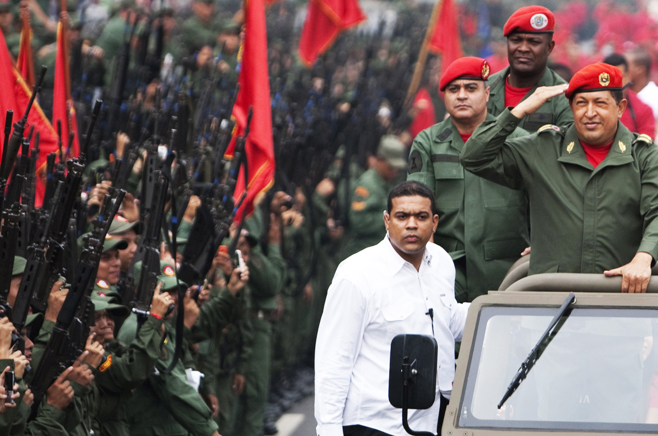 Venezuela's President Chavez arrives for a ceremony to commemorate the eighth anniversary of his return to power after a brief coup, in Caracas