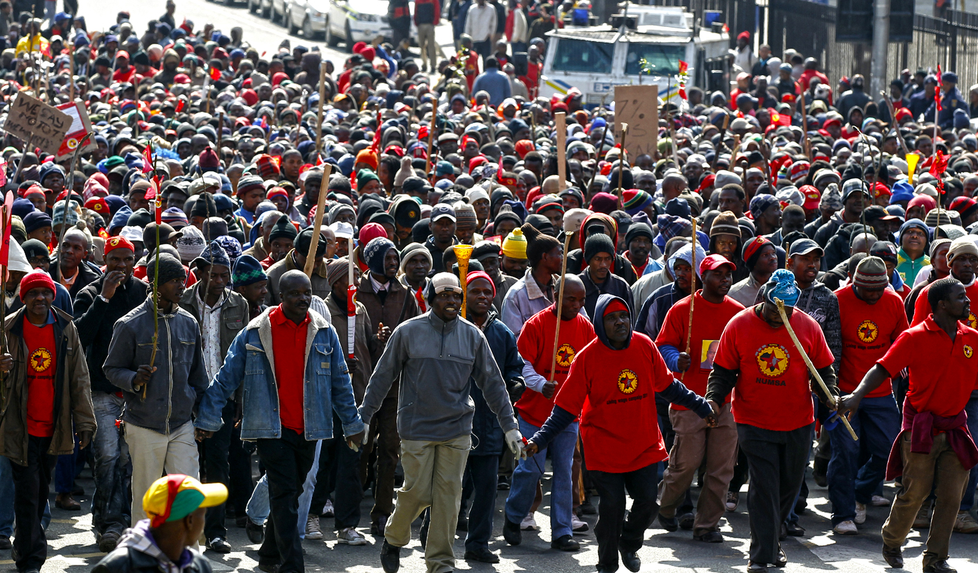 Workers take part in a march in the city of Johannesburg