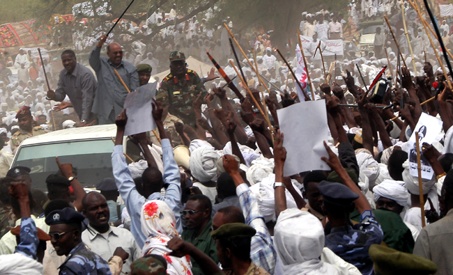 Sudan's President Bashir addresses his supporters during a rally at Bahr al-Arab in South Darfur