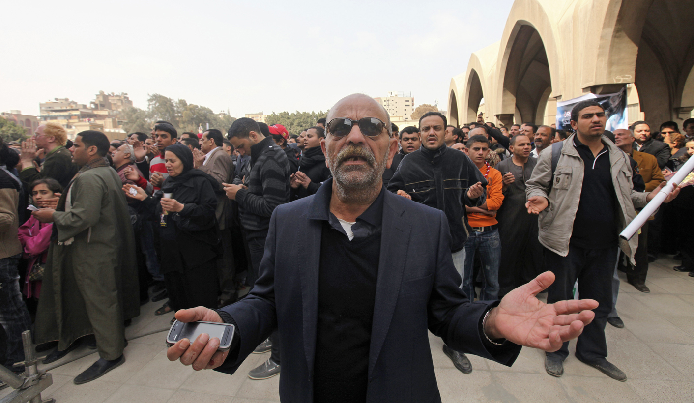Egyptian Christians mourn at funeral of Pope Shenouda III outside Abassiya Cathedral in Cairo