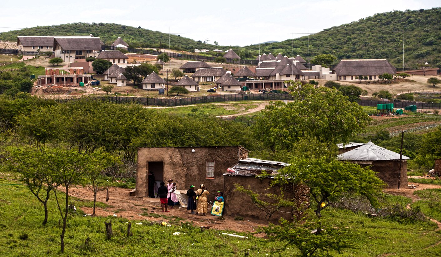 Supporters of South Africa's President Jacob Zuma prepare to prevent DA members from walking towards Zuma's house in Nkandla