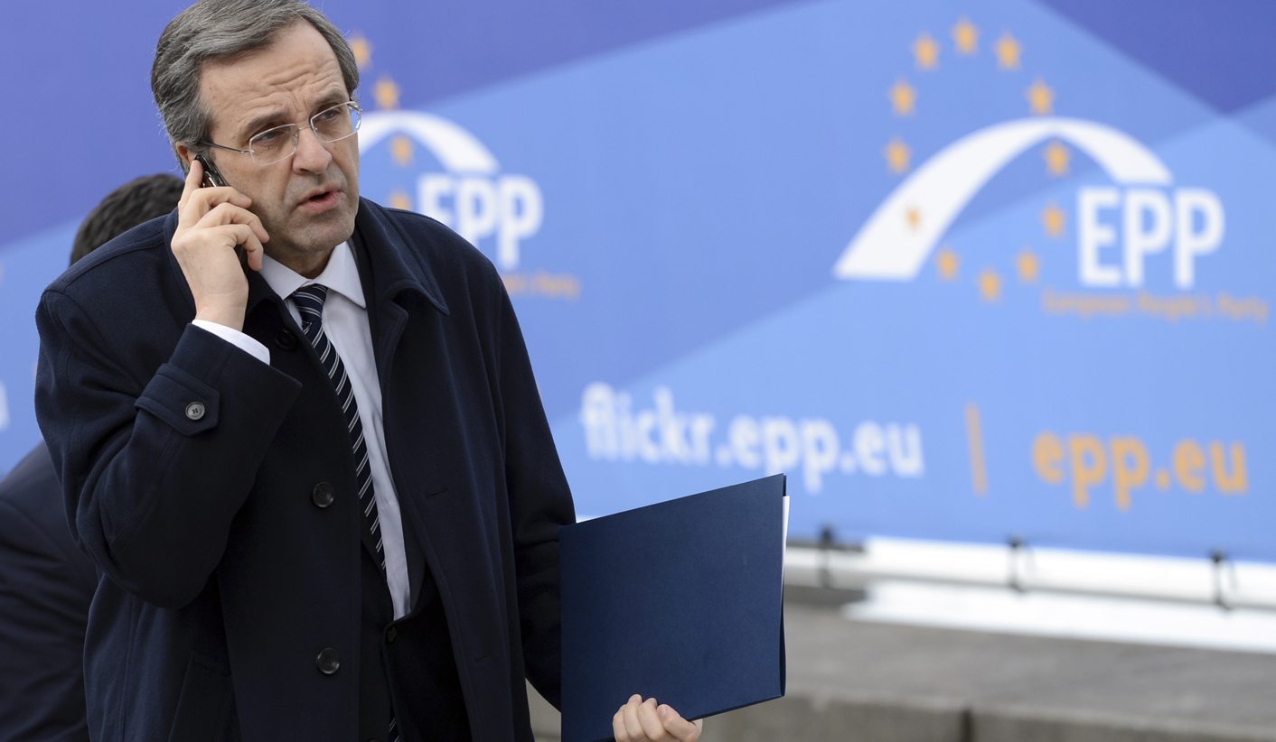 Greece passes reform law to unlock more EU/IMF rescue loans