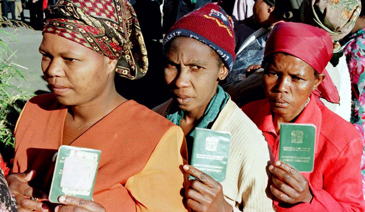 Residents of this black township south of Durban queue outside a polling station, June 26. South Afr..