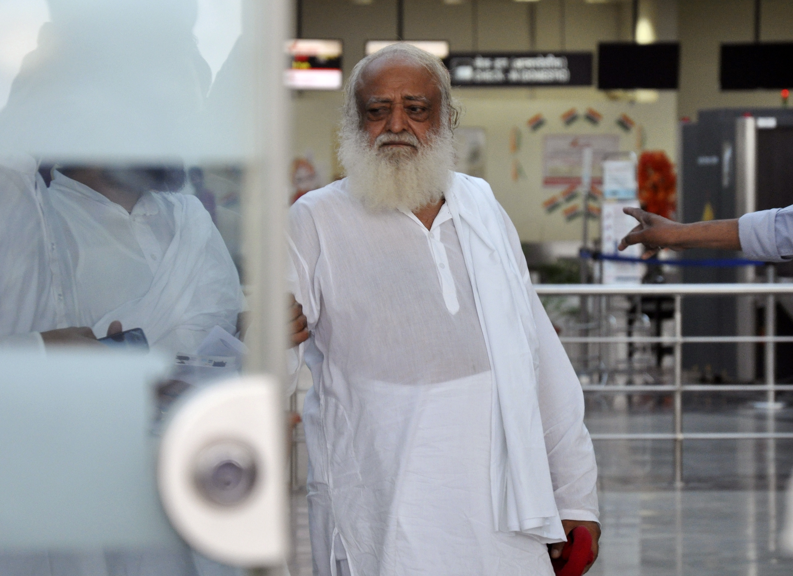 Self styled spiritual leader Asaram Bapu returns back after his flight was missed at Raja Bhoj airport in Bhopal.