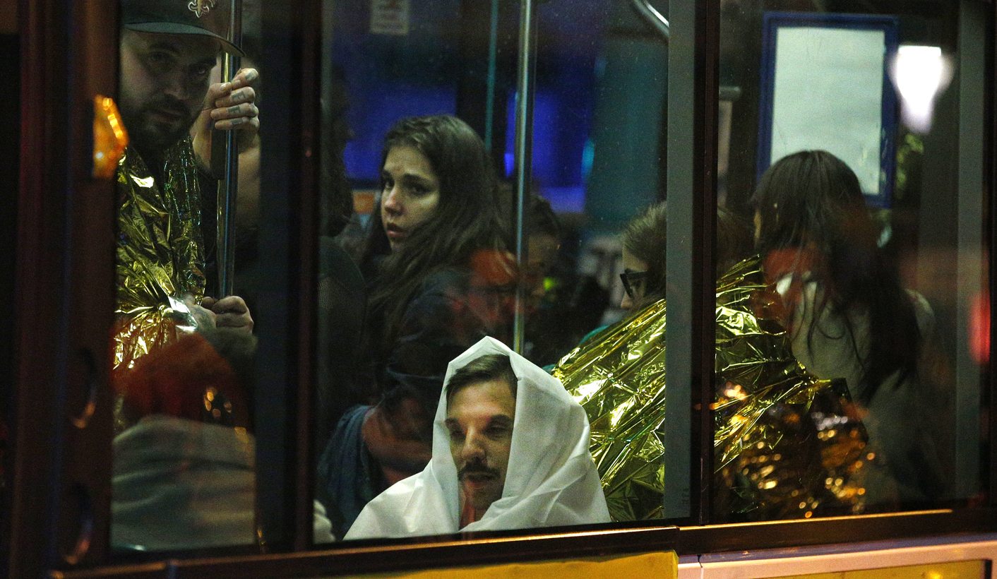 Paris attacks: shootings and explosions leave at least 120 dead