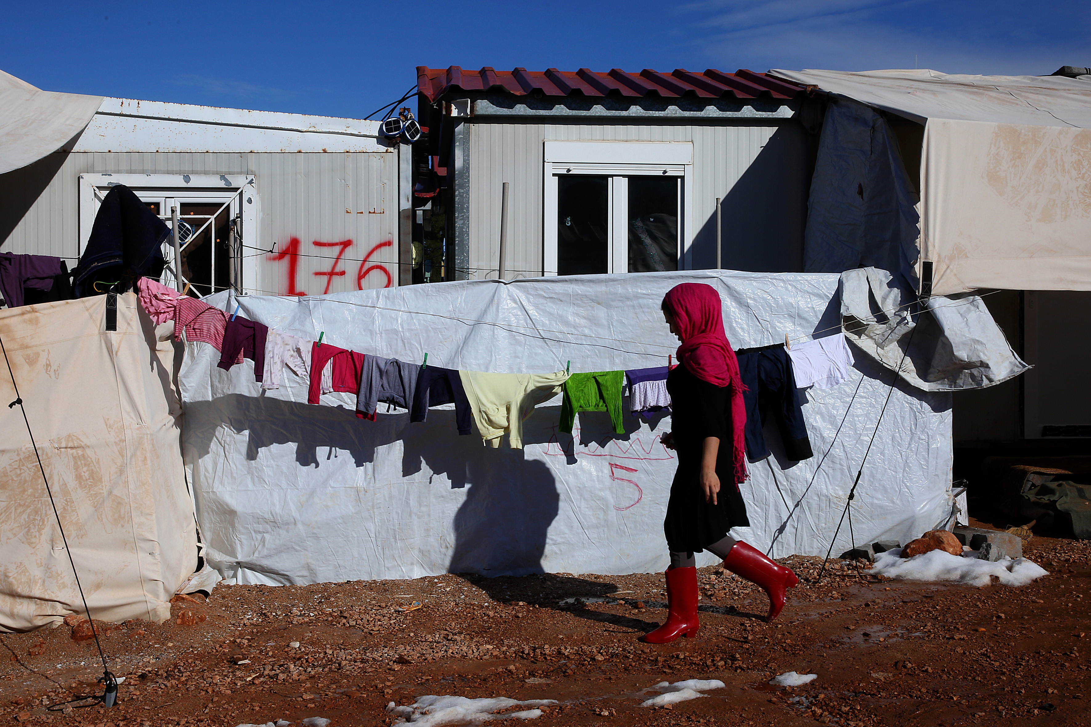 Greece says first migrant dies of Covid-19 since the pandemic