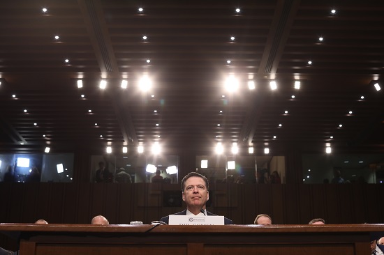 Watchdog faults Comey over Clinton probe, but says no bias