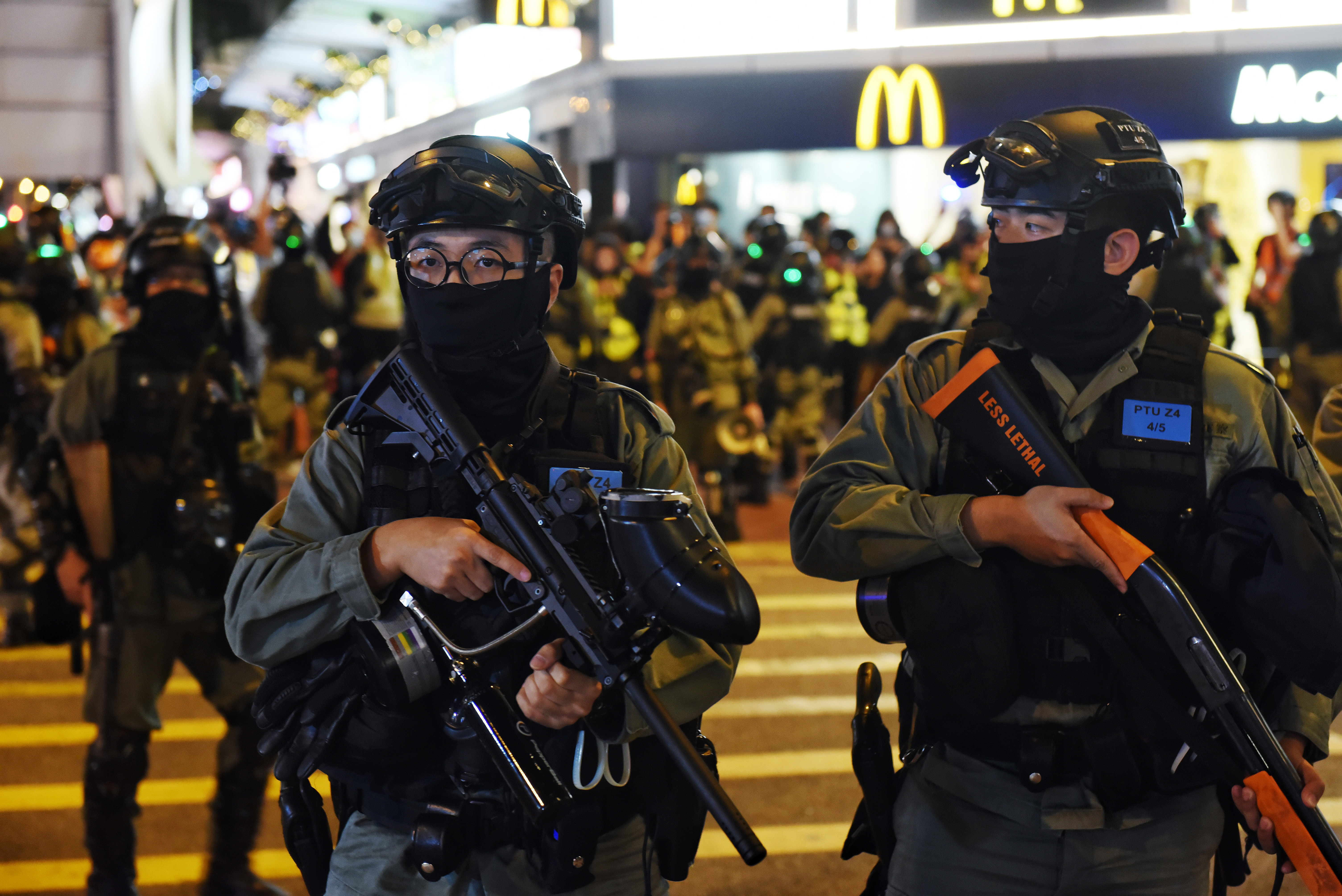 China suspends U.S. military visits to Hong Kong, sanctions U.S.-based NGOs