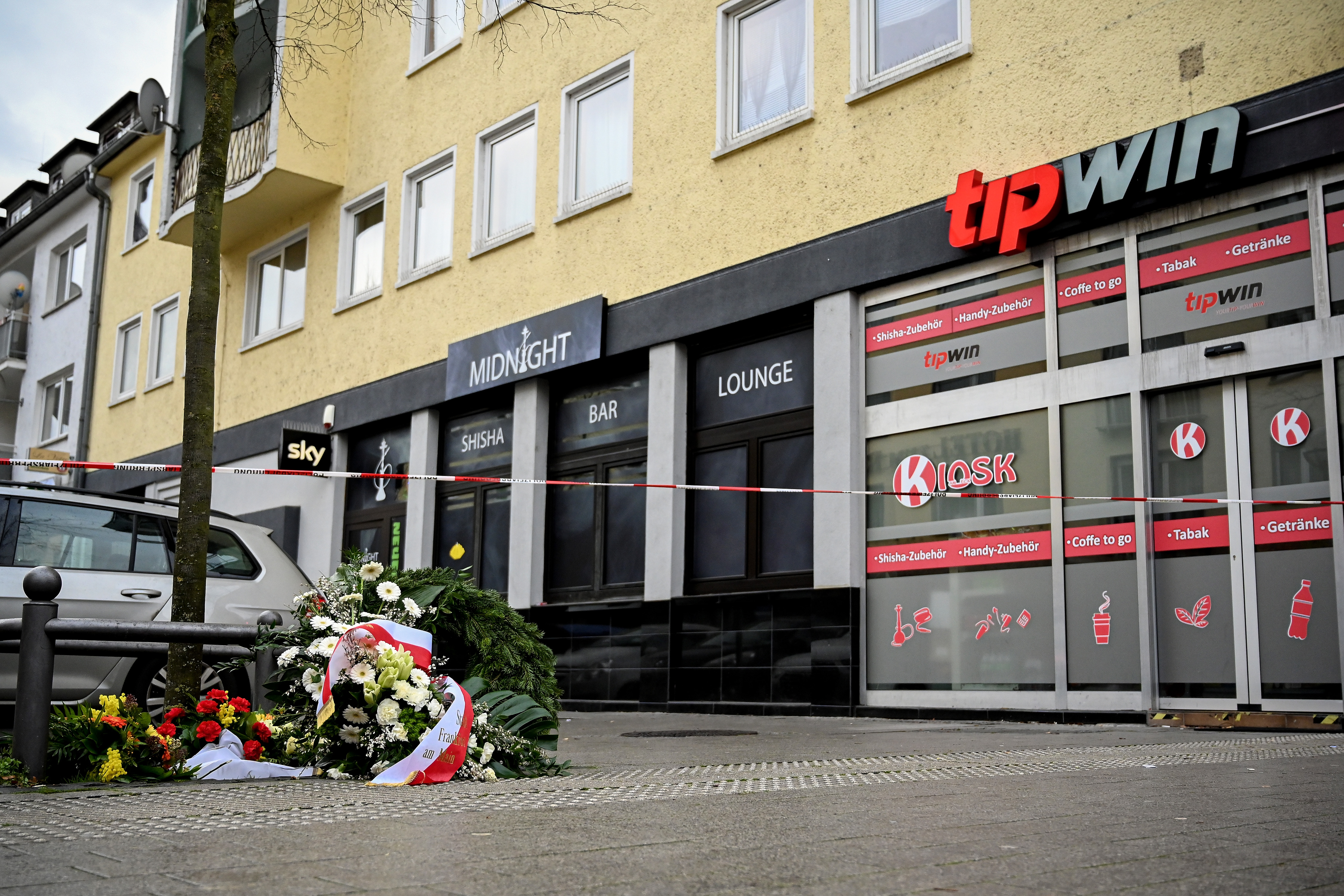 Germany bans far-right group, raids leaders' homes