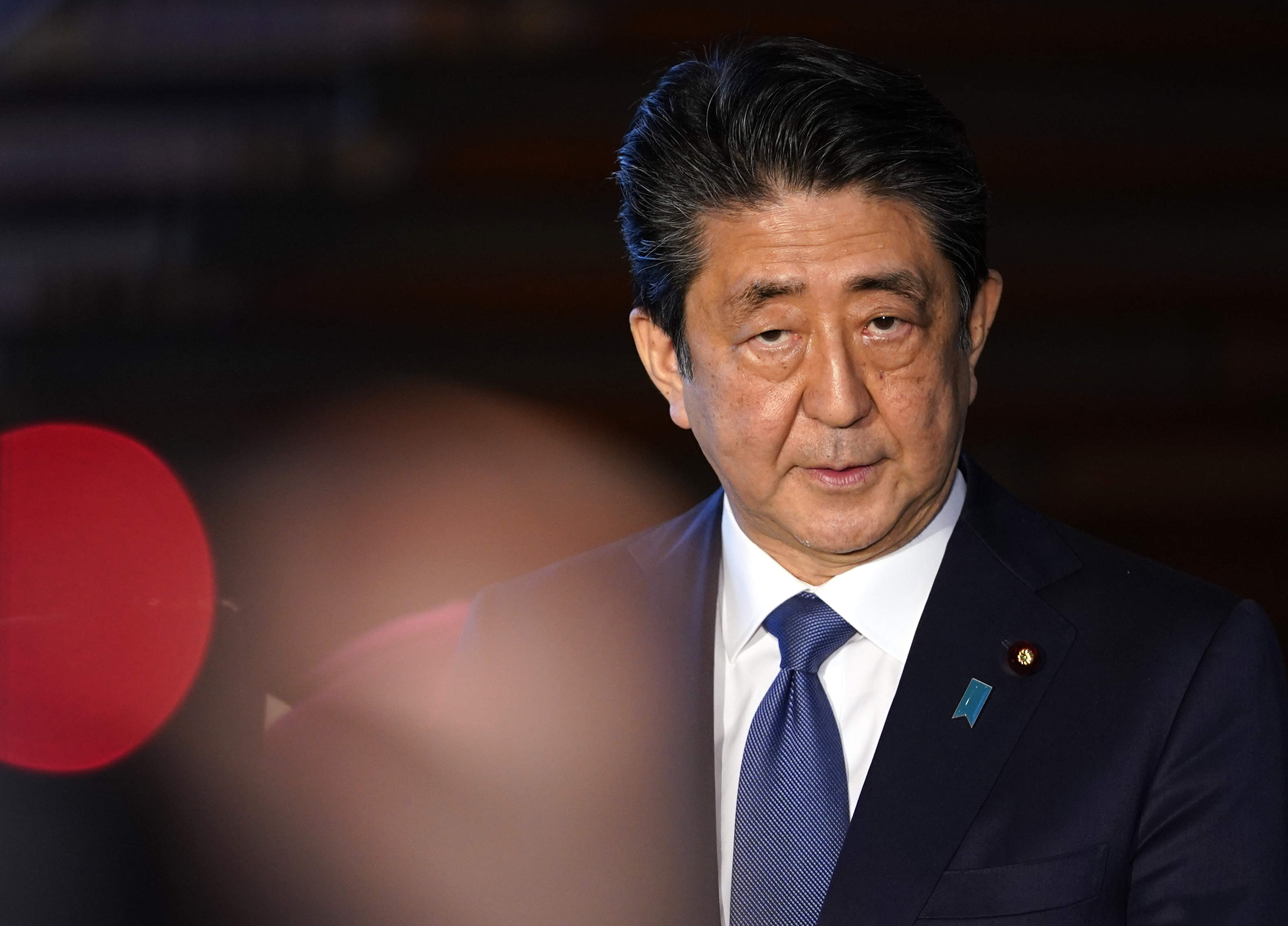 Japan's Abe unveils 'massive' coronavirus stimulus worth 20% of GDP
