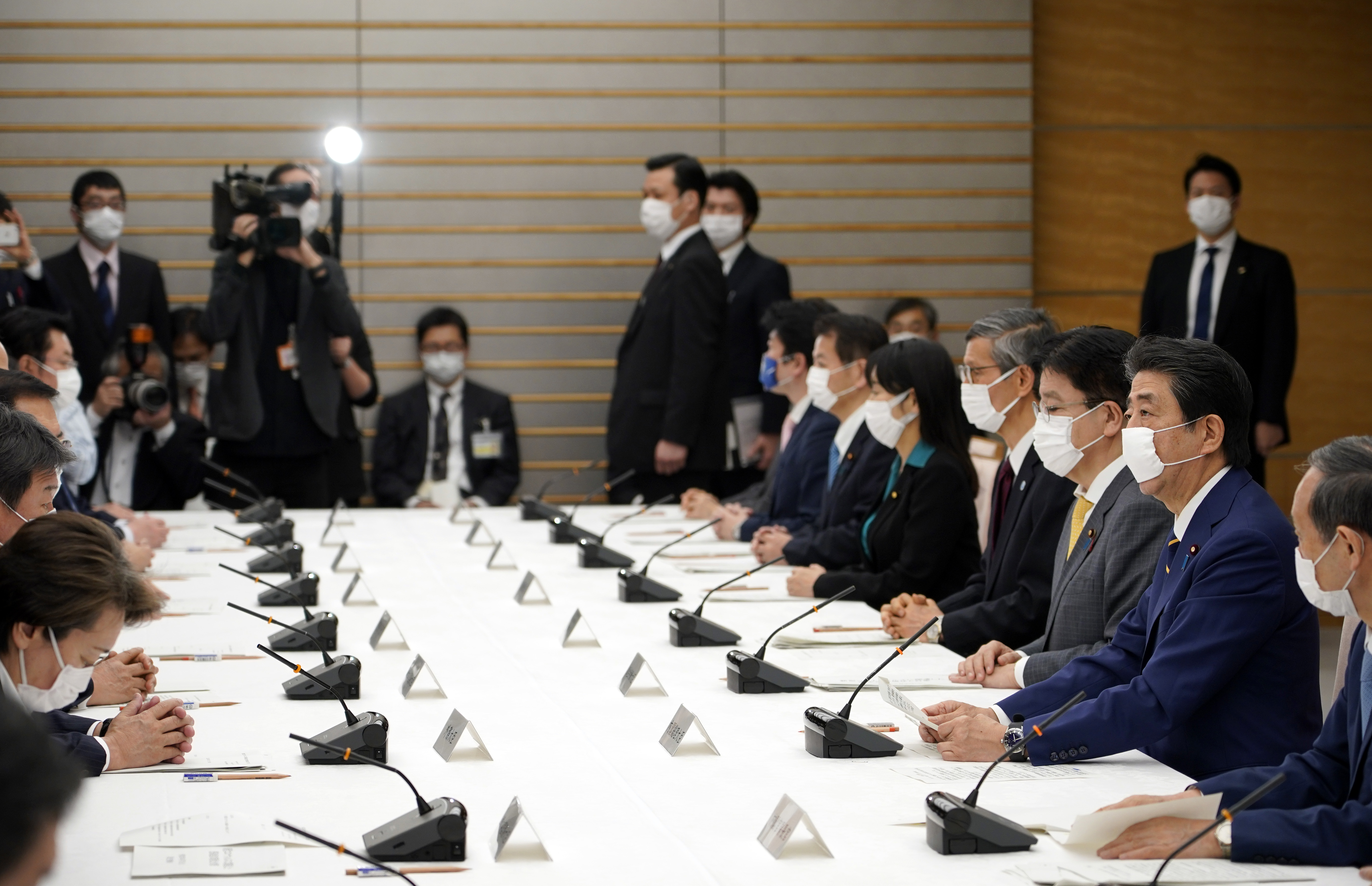 Japan declares coronavirus emergency, approves near $1 trln stimulus