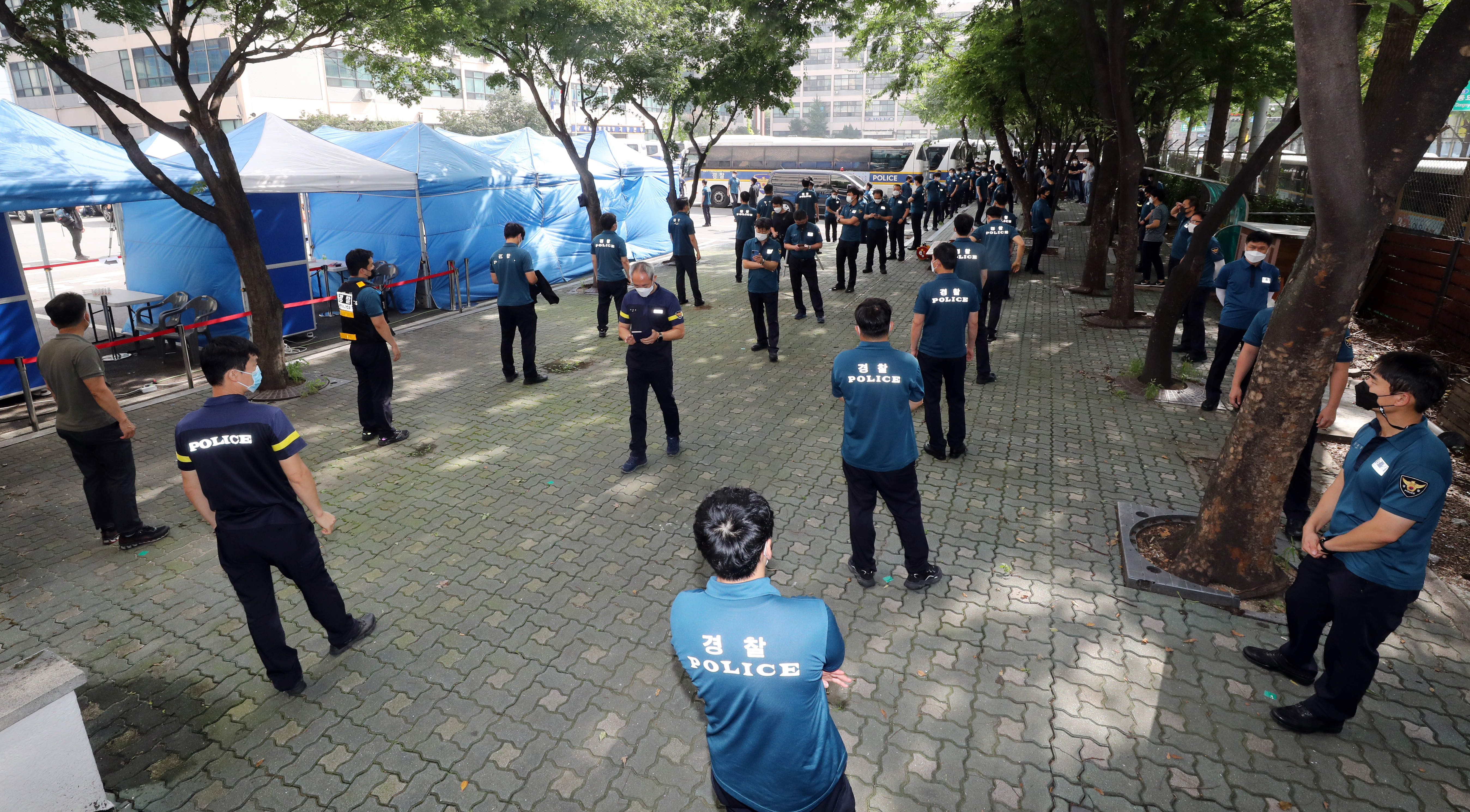 South Korea urges more testing, quarantines as coronavirus cases hit high