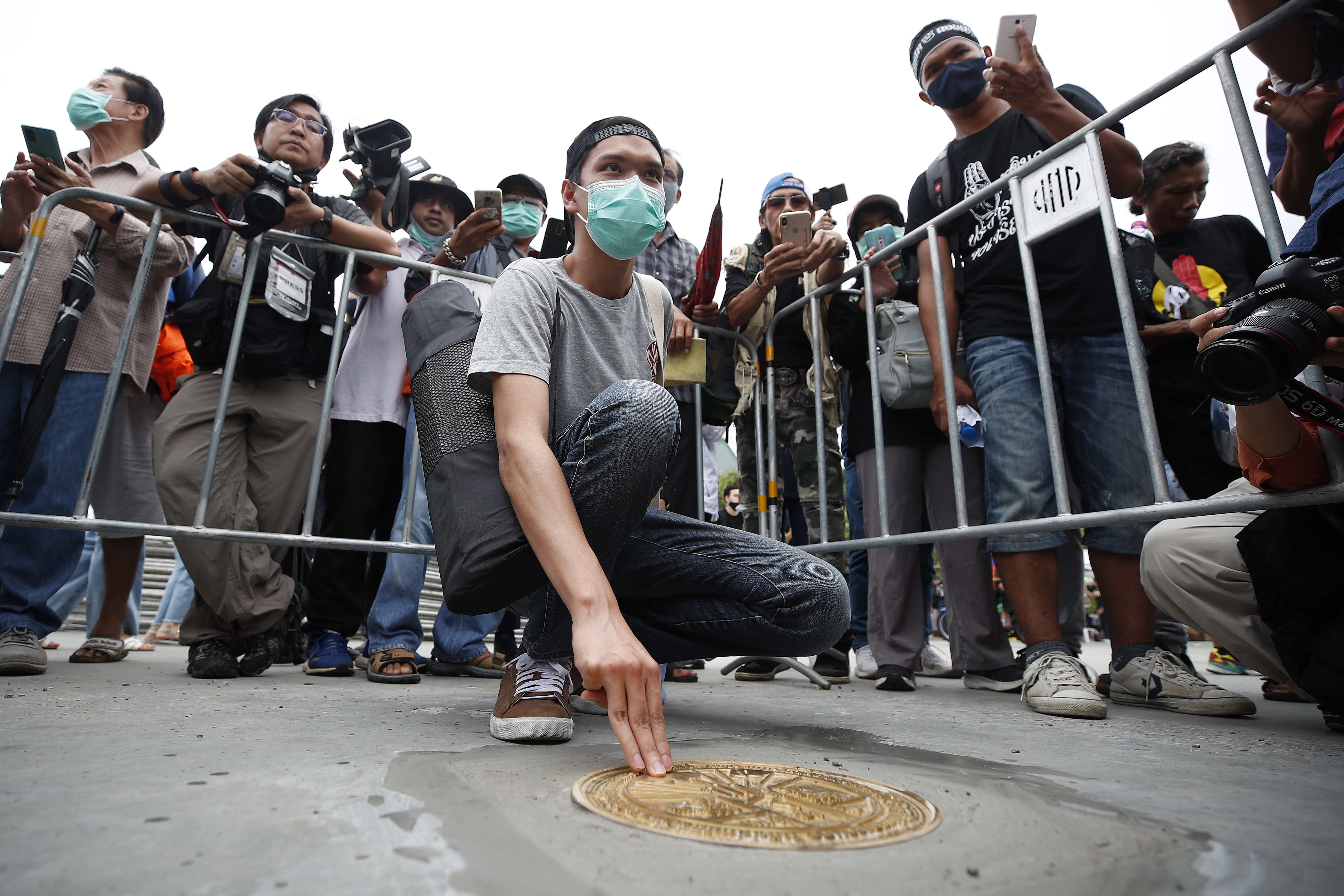 Thai police seize plaque targeting monarchy, weigh charges