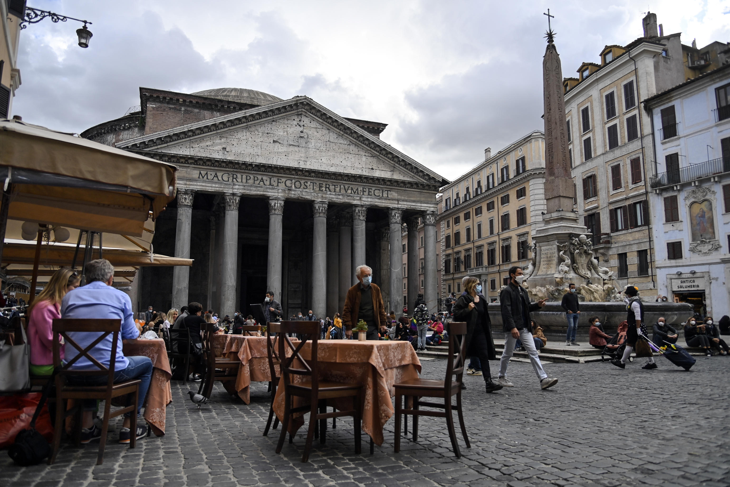 Italy unveils new COVID-19 restrictions as daily infections climb