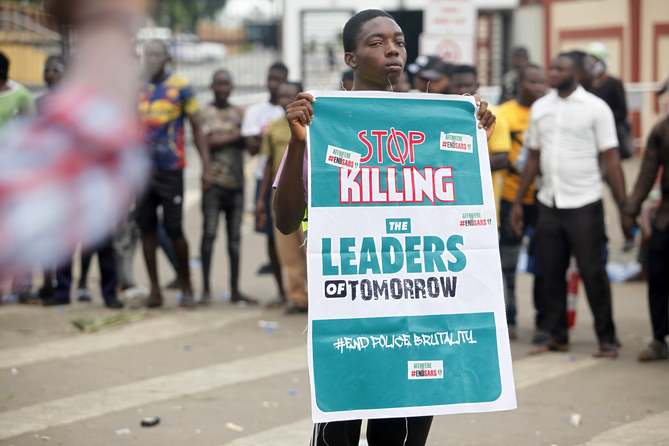 Lagos locked down after protesters fired on, president urges calm