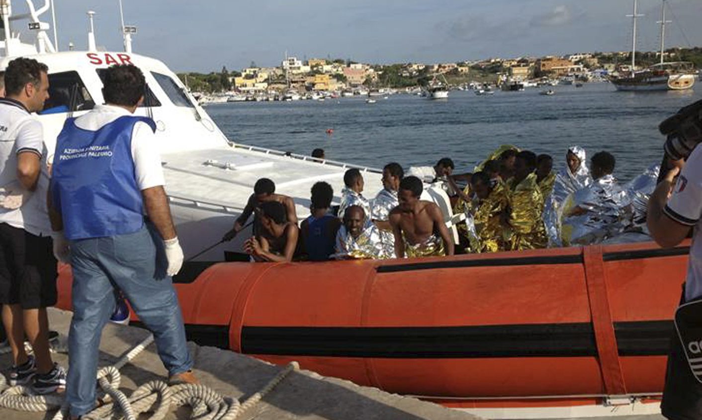 Hundreds dead, missing as migrant boat sinks off Italy