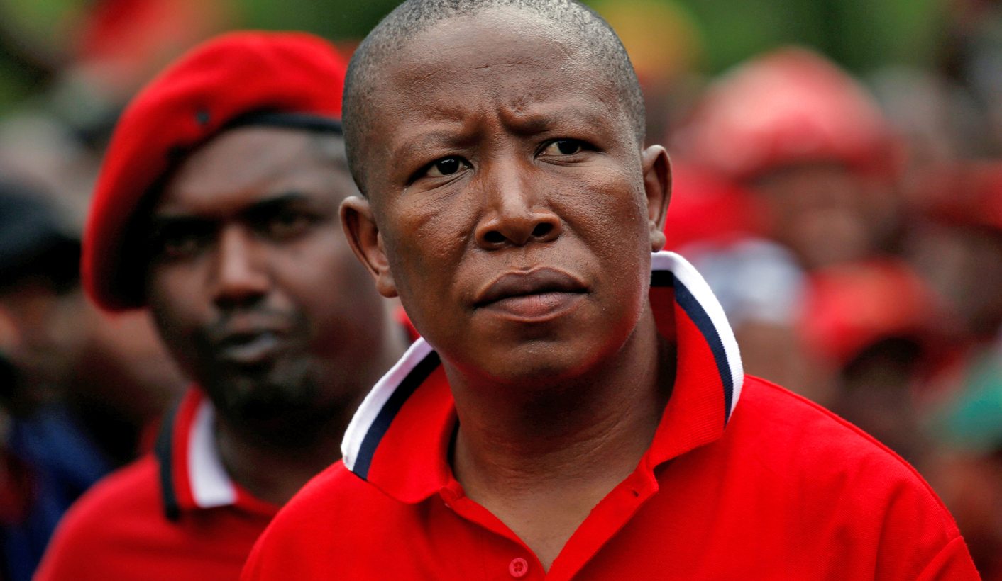 Economic Freedom Fighters party leader Julius Malema arrives with supporters for a demonstration in Pretoria