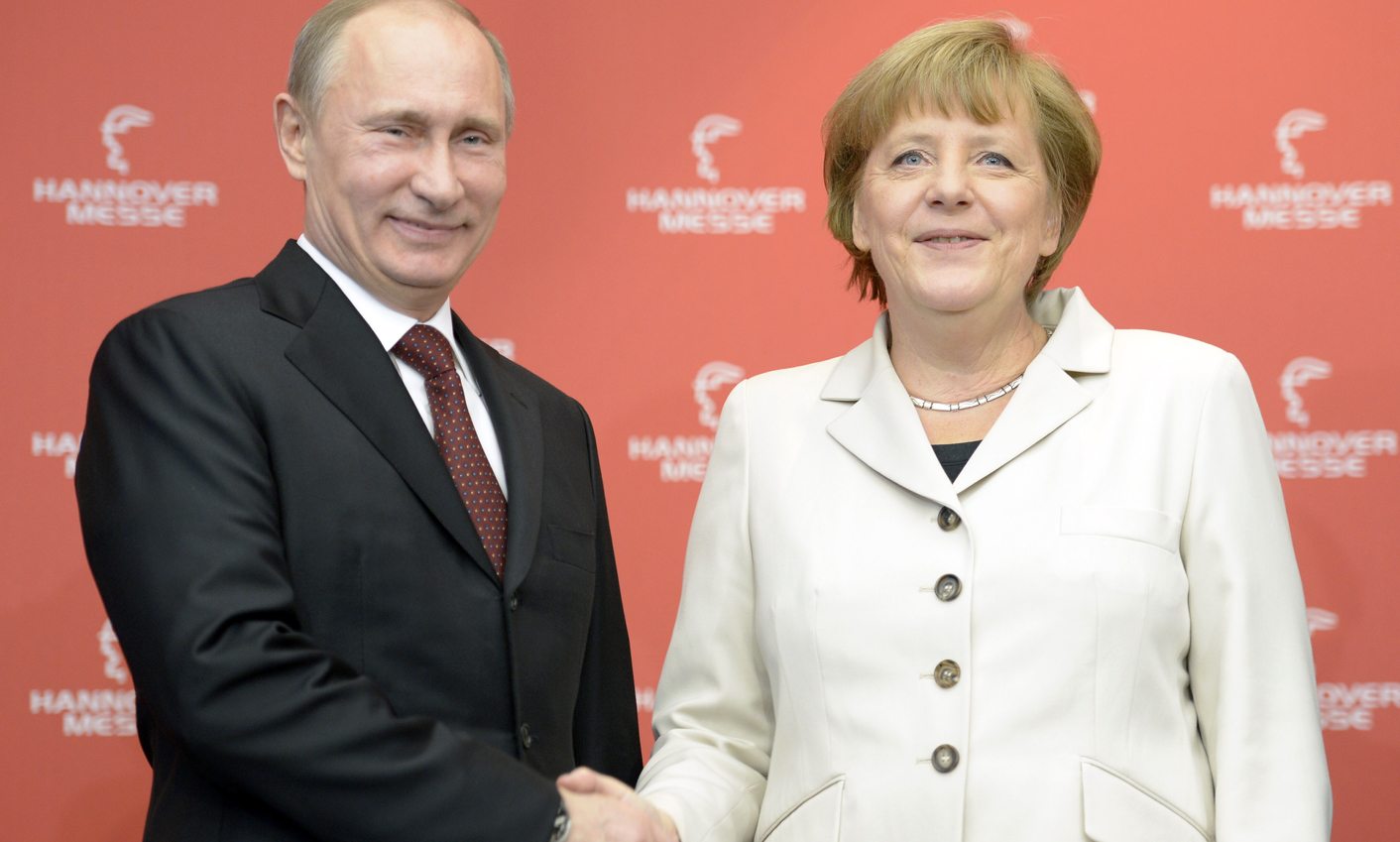 Russia needs active civil society, Merkel tells Putin