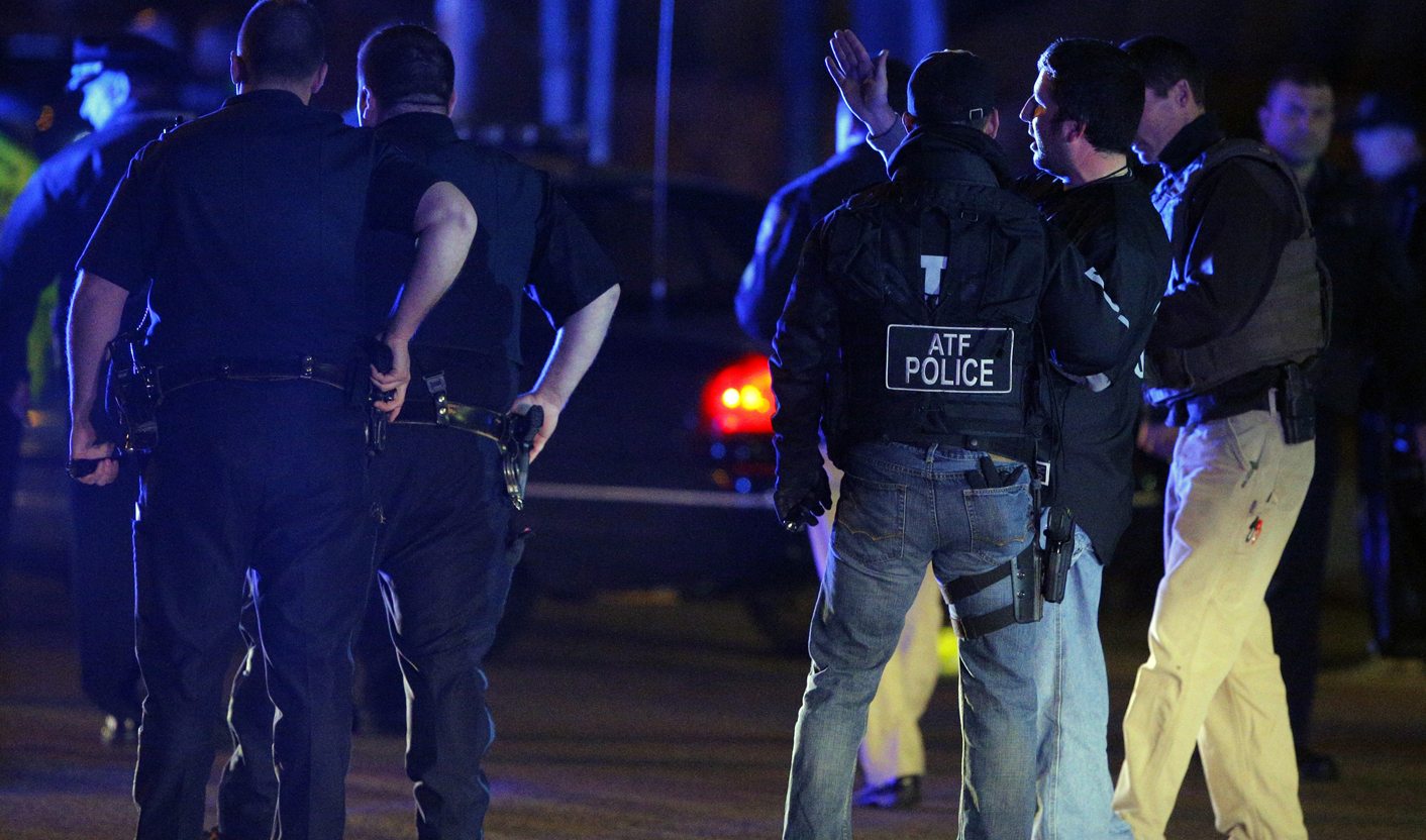 Police officer killed near Boston, link to bombing still unclear