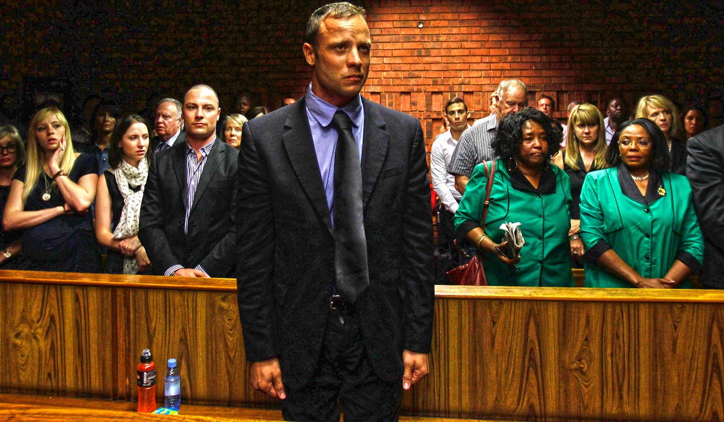 "Blade Runner" Oscar Pistorius awaits the start of court proceedings in the Pretoria Magistrates court