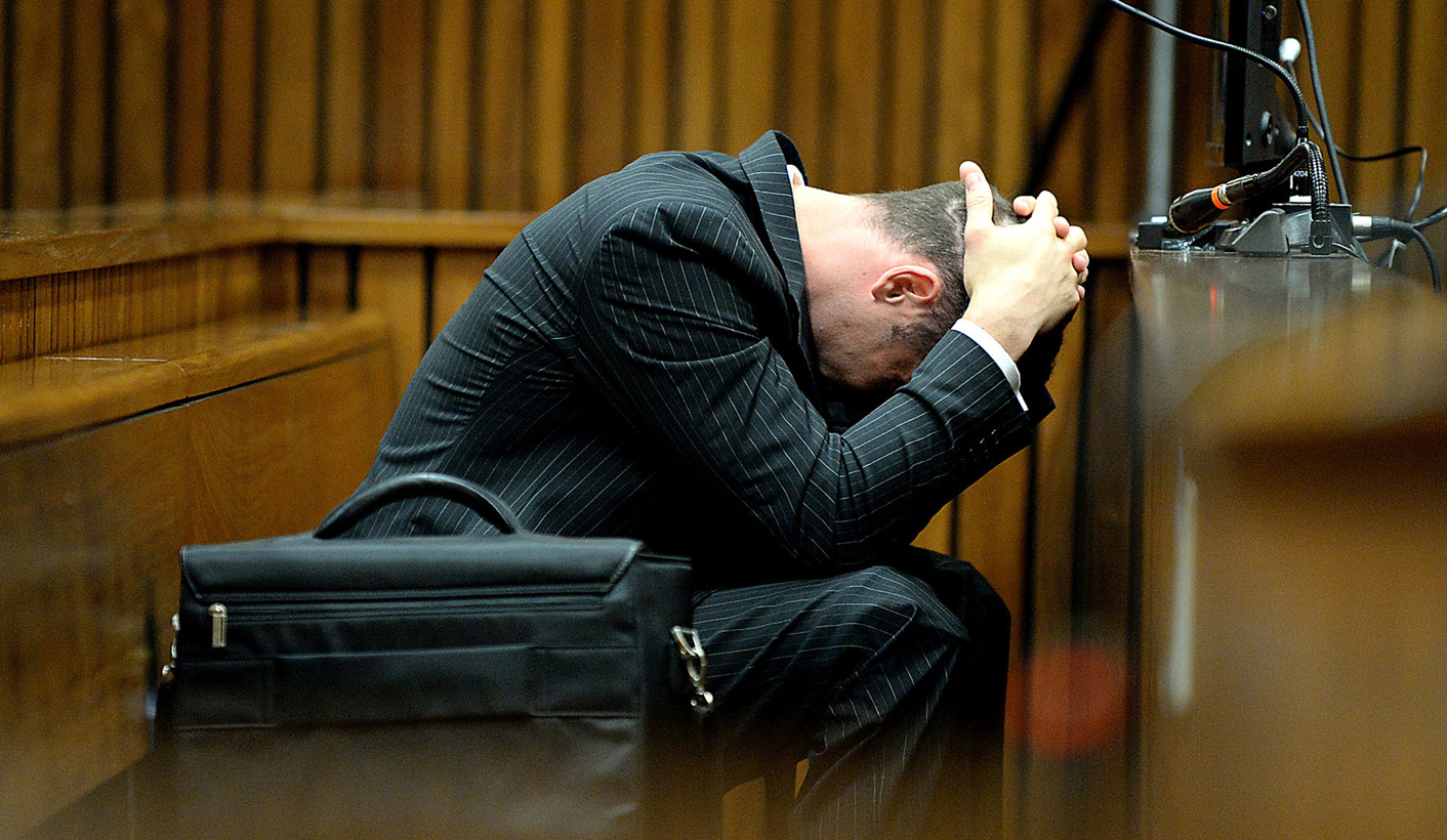 Olympic and Paralympic track star Oscar Pistorius reacts during a testimony at the North Gauteng High Court in Pretoria