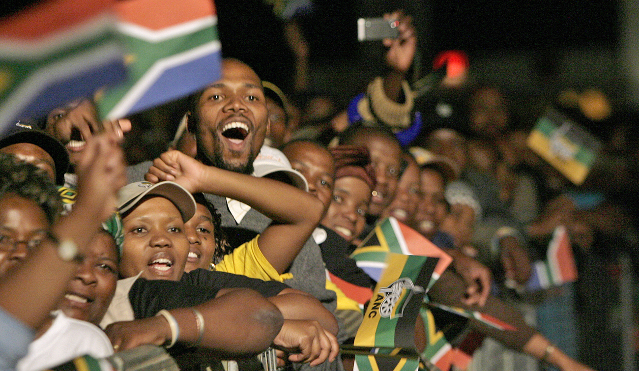 ANC supporters celebrate during victory celebrations at Nasrec in Johannesburg