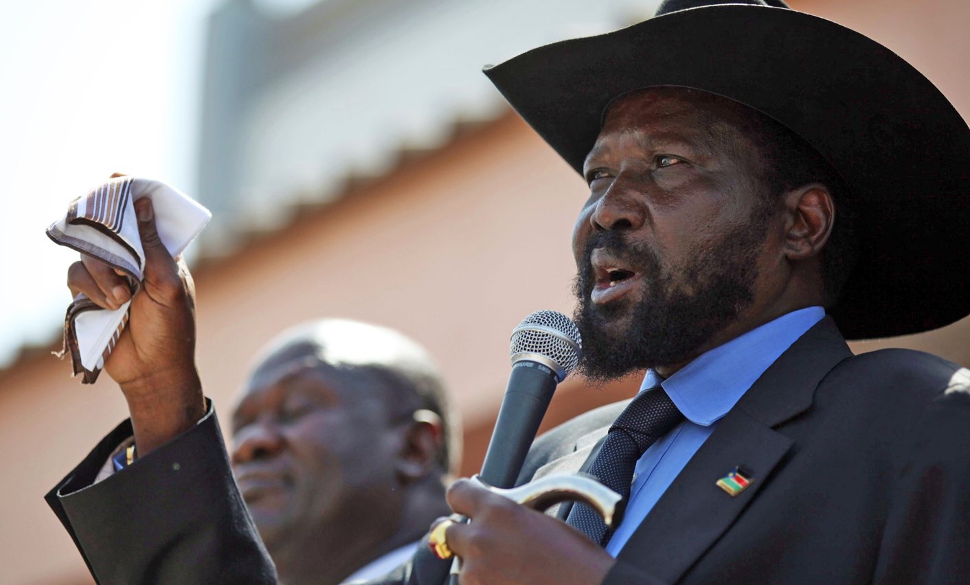 South Sudan's President Salva Kiir addresses a crowd of pro-government supporters outside parliament in Juba