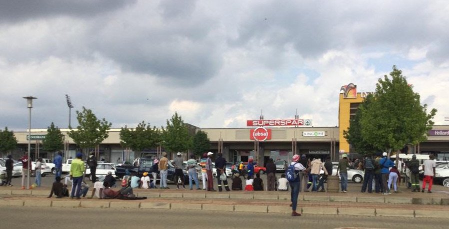 Social grants: the young men who make a living in a queue for others