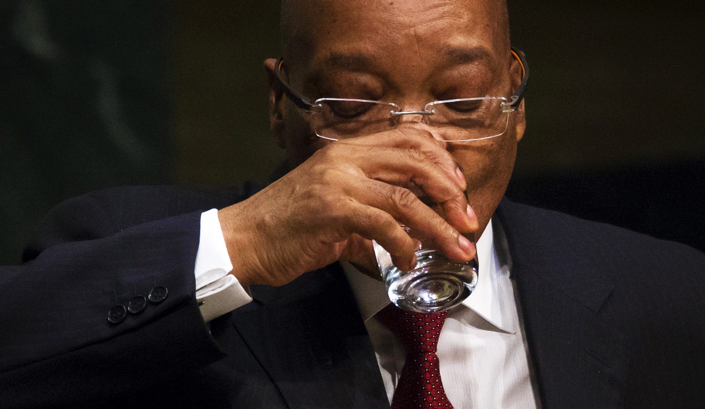 President of South Africa Jacob Zuma takes a drink as he addresses attendees during the 70th session of the United Nations General Assembly at the U.N. headquarters in New York